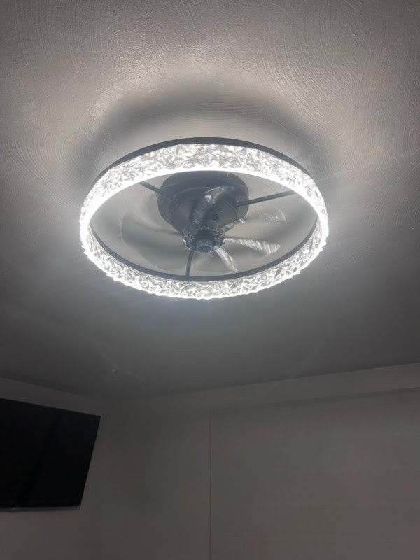 After: a new ceiling fan with a glowing crystal LED ring